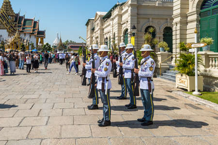 Bangkok, Thailand - December 7, 2019: Unidentified guardians of King's Guard with rifle weapons...