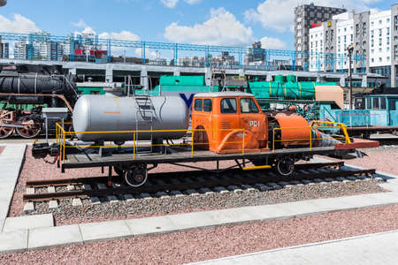 Kyiv, Ukraine - May 23, 2021:  The Museum of historical Railway Transport in Kyiv, Ukraine. The railway vehicle RS-1 with an aircraft jet engine in the foreground.のeditorial素材