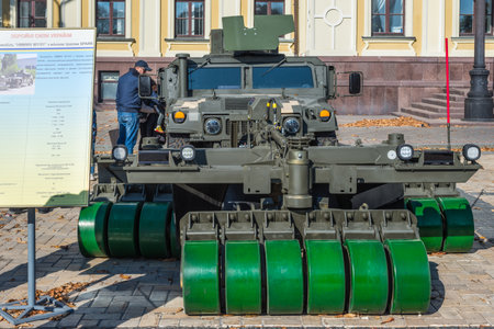 Kyiv, Ukraine - October 15, 2021: The exhibition of modern samples of military equipment "The digital future of the army" is being held in Kyiv. The Wheeled Vehicle (Humvee) with roller minesweeper Spark.のeditorial素材