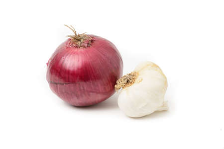 Red onion with garlic on a white background.の写真素材