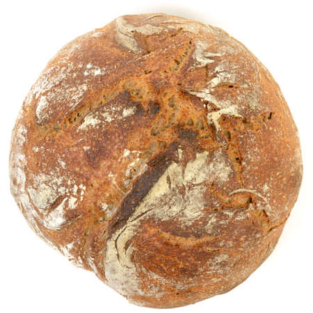 A loaf of sourdough bread isolated on a white background.の写真素材