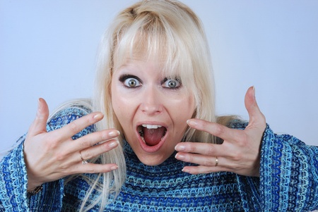 Beautiful surprised woman の写真素材