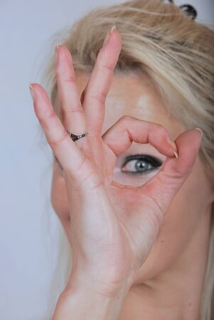 Woman giving OK signの写真素材