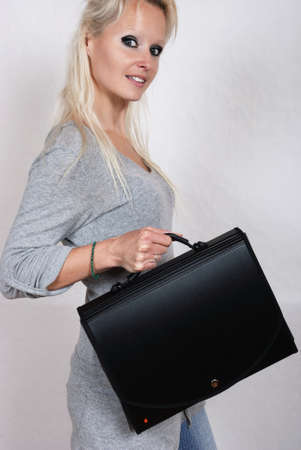  Businesswoman holding briefcaseの写真素材