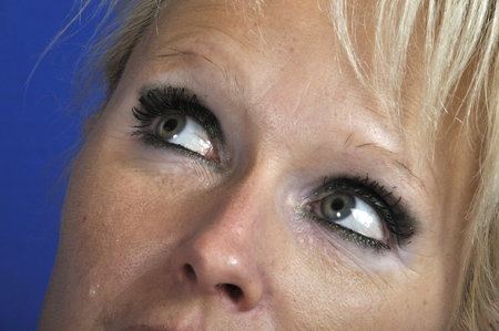 Woman's eye with tear