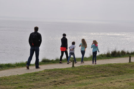 PLOUGONVELIN-FRANCE_APRIL-23-2015 Family walking at the Pointe Saint-Mathieuのeditorial素材