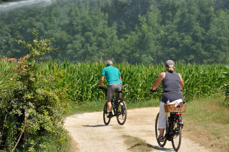 DOMME_ FRANCE, JULY 24, 2016: Cyclist in the countryside of Domme in Dordogneのeditorial素材