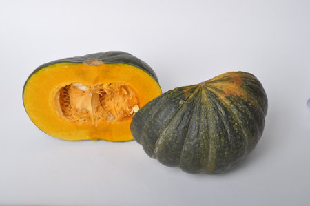 green pumpkin on a white backgroundの写真素材