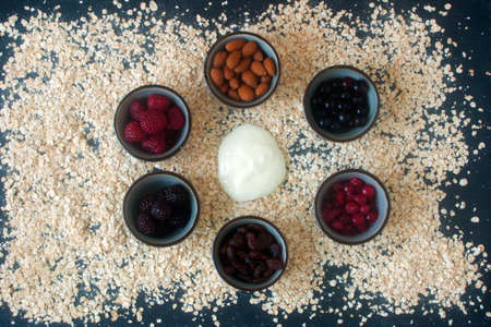 Bowls with ingredients for cereals
