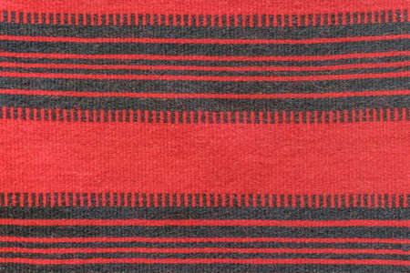 Texture of red and black colored carpet.の写真素材