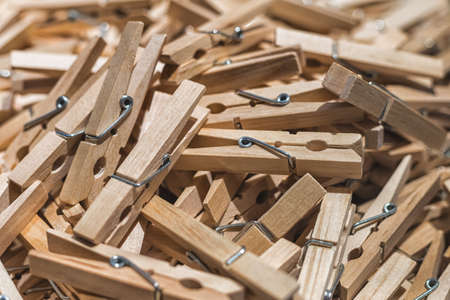 Wooden clothes pins texture close up.