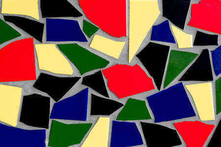 mosaic with colored tiles on a wall as backgroundの写真素材