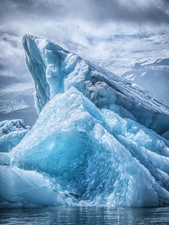 Picture of Beautiful iceberg in the jokulsarlon glacier lagoon. Global warming concept. Melting glacierの写真素材