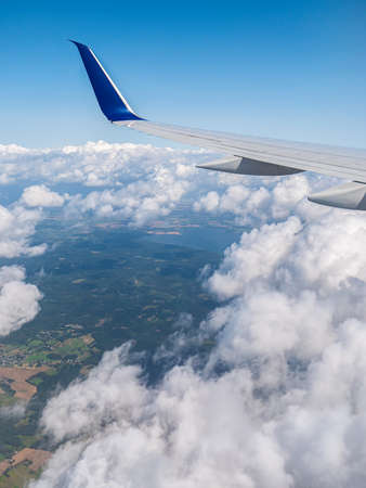 earth and plane wing view from an illuminatorの写真素材