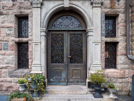 Picture of Metallic entrance door to the vintage buildingの写真素材