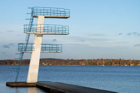 Picture of diving tower on the blue lakeの写真素材