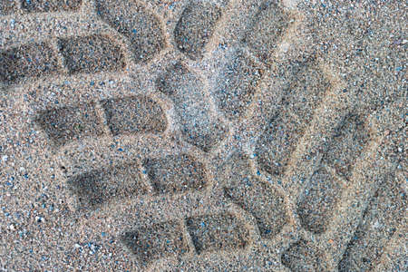 Picture of Tractor footprint on the beach, well defined, isolated and big.の写真素材