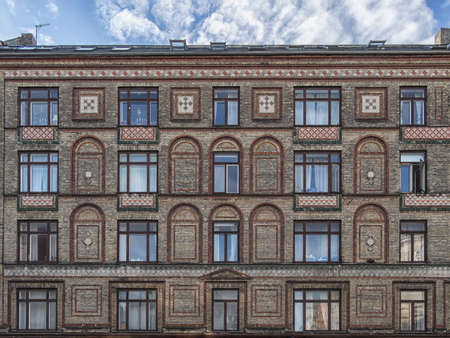 Image of Amsterdam canals and typical houses with clear summer skyの写真素材