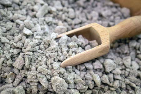 Image of salt natural mineral cubes in the bowl with wooden scoopの写真素材