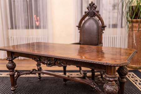 Image of Old studying room with leather armchairs and vintage wooden table.の写真素材