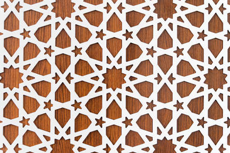 Star shaped repeating pattern with wooden backgroundの写真素材