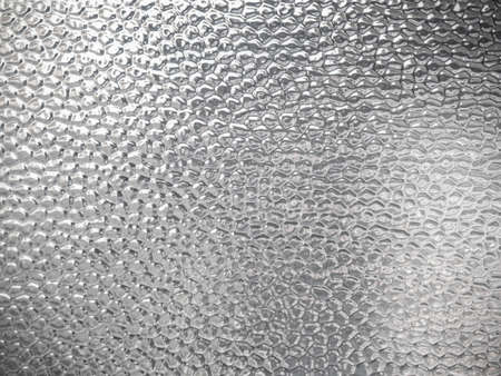 Glass surface with bubble textured materialの写真素材