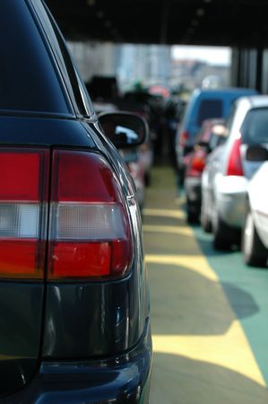 Cars waiting in the heavy traffic.