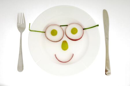 Face made of fruit and vegetablesの写真素材