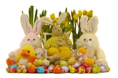 Easter decoration with eggs, bunnies, and flowers.