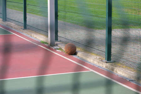 Basketball, the forgotten athletes on the outdoor basketball court after the workout.の写真素材