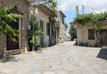 A quiet, narrow street in a small mountain town.の写真素材