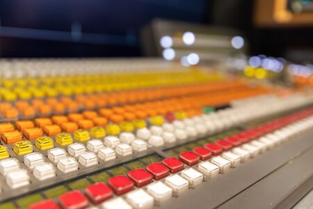 Professional broadcast video switcher used during live television productions, shallow depth of...
