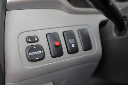 vehicle sideview mirror controls and security system indicator light