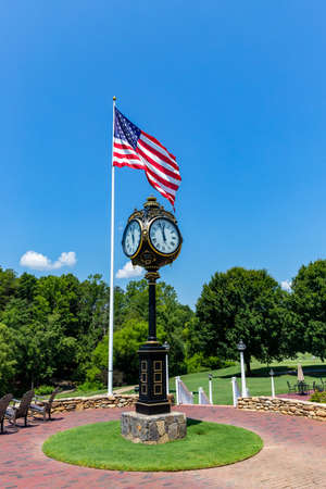 Mooresville, NC, USA: Clock and American Flag at the Trump National Golf Club Charlotteのeditorial素材