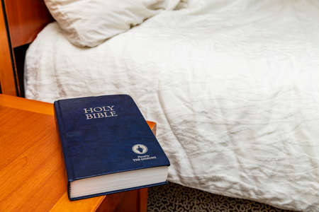 Hattiesburg, MS / USA - September 17, 2020: Gideons Bible on nightstand in hotel roomのeditorial素材