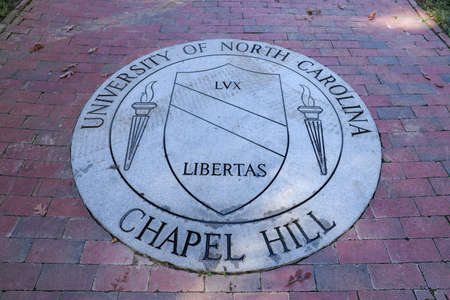 Chapel Hill, NC / USA - October 21, 2020: The University of North Carolina Chapel Hill Seal in brick...