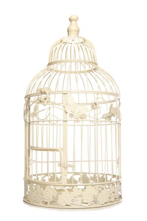 Vintage looking bird cage isolated studio cutoutの写真素材