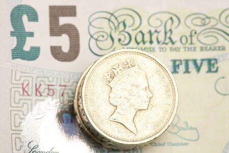 five pound note and pound coinsの写真素材