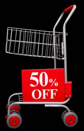 Shopping trolley with 50 percent off sign on black backgroundの写真素材