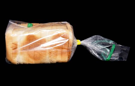 thick sliced bread on black backgroundの写真素材