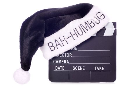 Bah humbug santas hat on movie clapper board cutoutの写真素材