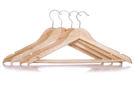 four wooden coat hangers studio cutoutの写真素材