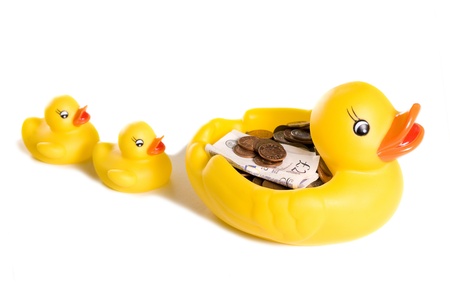 rubber ducks with money studio cutoutの写真素材
