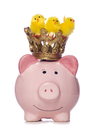 Piggy bank with easter chicks cutoutの写真素材