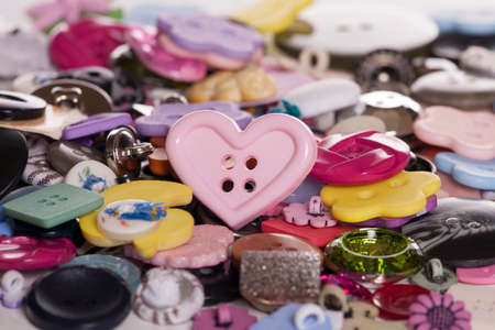 Pile of buttons abstract background の写真素材
