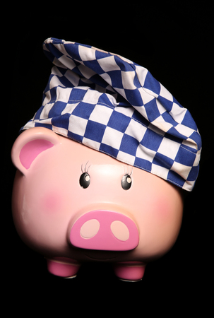 Saving money eating out on black backgroundの写真素材
