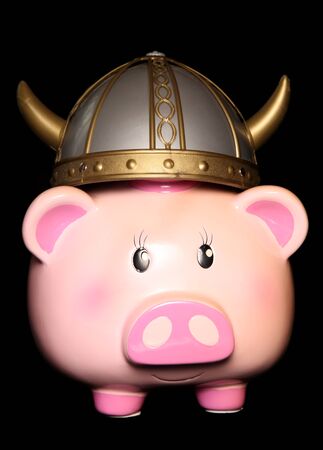Piggy bank wearing a viking hat cutoutの写真素材