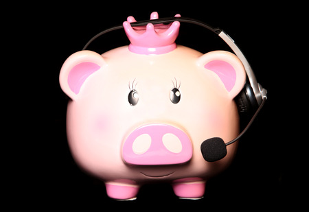 piggy bank wearing headset cutoutの写真素材
