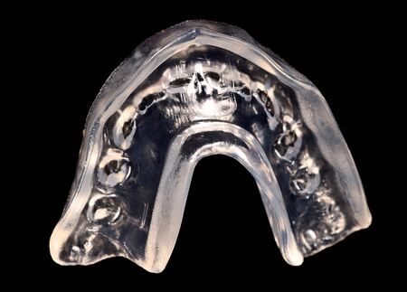 Clear gum sheild on black backgroundの写真素材