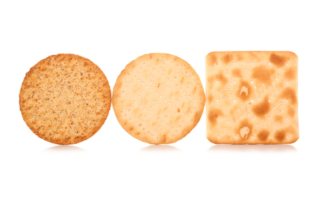three cracker biscuits on white backgroundの写真素材